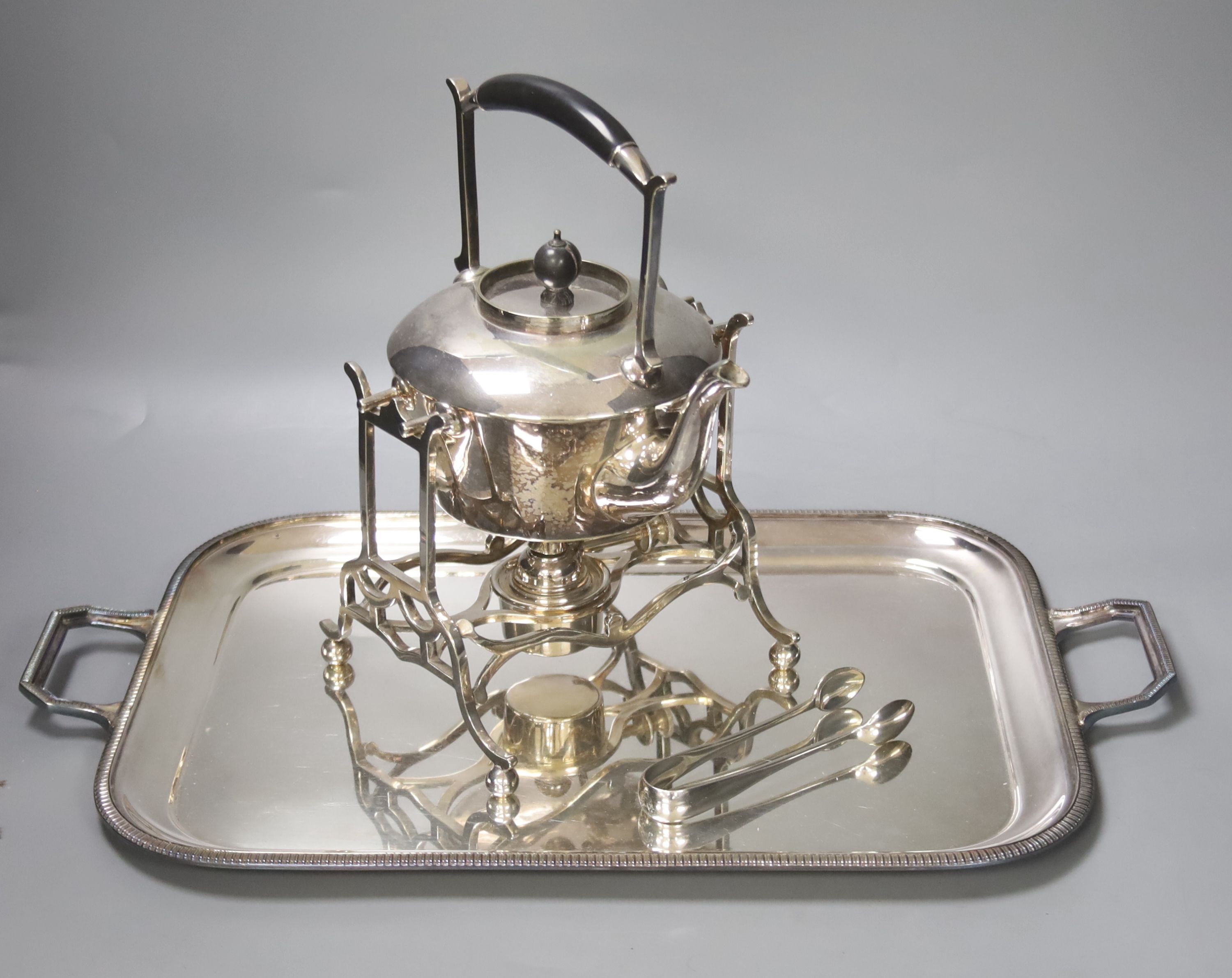 Sundry plated wares including a spirit kettle, stand and burner, and a two handled tea tray